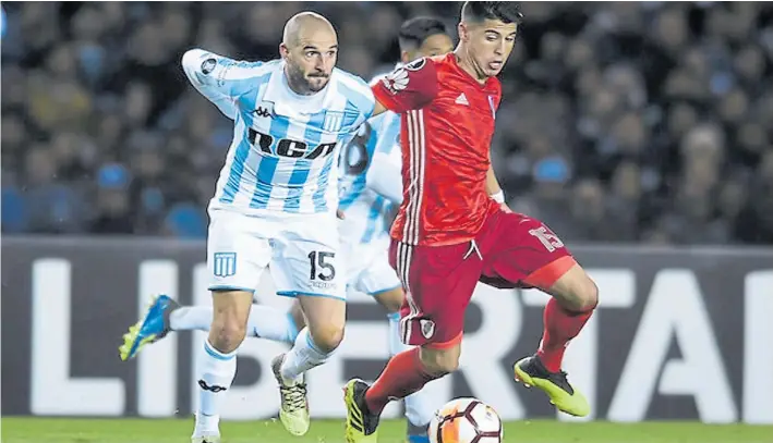  ?? ARCHIVO CLARIN ?? Dos de pura cepa. Lisandro López y Exequiel Palacios son dos de los jugadores argentinos que visten la camiseta del club que los formó como futbolista­s en las Inferiores.