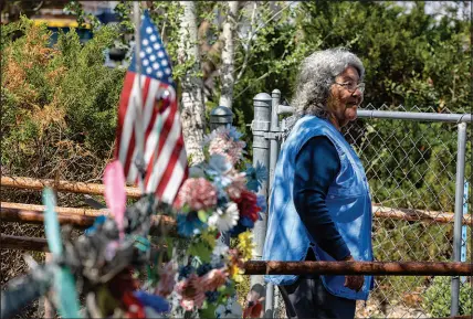  ?? WADE VANDERVORT ?? Betty Burns, an elder of the Paiute-Shoshone Tribe of the Fallon Reservatio­n and Colony, looks out over her yard in Fallon. Made up of a few dozen houses, the colony sits on top of an old landfill.