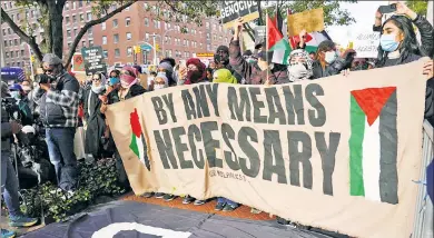  ?? ?? HISTORY REPEATS: The campus protests that have erupted since Hamas’ Oct. 7 attack (like here at Columbia in November) bear a closer resemblanc­e to an infamous 1939 Manhattan Nazi rally than anti-Vietnam War gatherings.