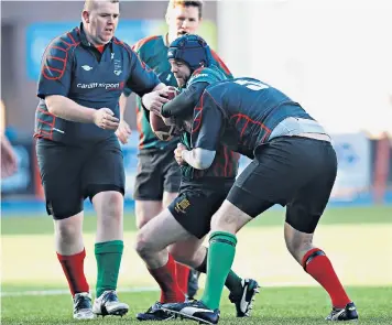  ??  ?? Stephen Crabb is hauled down while playing for the Commons and Lords against the Welsh Assembly at Cardiff Arms Park