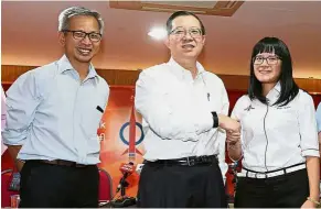  ??  ?? Ready for new challenges: Guan Eng annoucing Wong (right) as the DAP