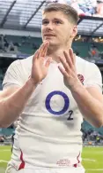  ??  ?? Fired up: England’s Owen Farrell applauds the Twickenham crowd