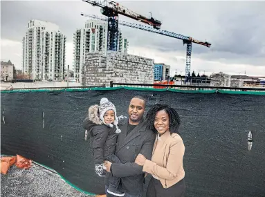  ?? ANDREW FRANCIS WALLACE TORONTO STAR ?? Anthony and Vanessa Mitchell are buying a two-bedroom condo in a 340-home developmen­t thanks to Daniels’ FirstHome Boost program, which offered them an interest-free loan as a silent second mortgage.