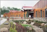  ?? Hearst Connecticu­t Media file photo ?? The new Sandy Hook Elementary School school built to replace the one where 20 first-graders and six educators were killed in December 2012.