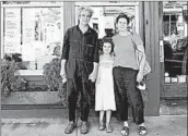  ?? LISA TOLIN ?? Emiliano Coppa, left, and chef Anna Klinger with their daughter outside their trattoria, Al di La, in New York.
