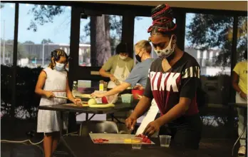  ?? (Special to The Commercial) ?? Students learn to prepare nutritious food during a CrEATe Lab camp taught by Faith Anaya, owner of Kids Cook. The next sessions will be at the Arts & Science Center for Southeast Arkansas on Feb. 6, Feb. 20 and Feb. 27.