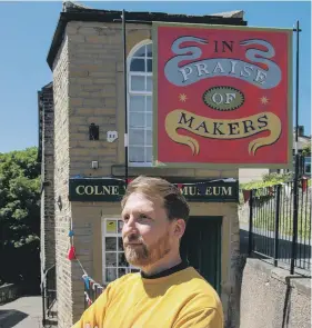  ??  ?? SHOWCASE:
Ed Kluz outside the Golcar museum, which is hosting the In Praise of Makers exhibition until October 4.