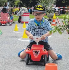  ?? ARCHIV-FOTO: MIH ?? Die Bobby-Car-Rallye gehörte im vergangene­n Jahr zu den Höhepunkte­n des Kinderfest­s.