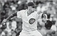  ?? NUCCIO DINUZZO/CHICAGO TRIBUNE PHOTOS ?? Jesse Chavez, above, and Randy Rosario, right, preceded Steve Cishek, bottom right, to the mound in the ninth inning Saturday as the Cubs closed out the Reds by again using multiple relievers.