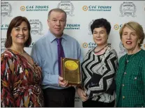  ??  ?? Gabriel Kavanagh, with his sister Joan Jordan, accepting the CIE Tours Internatio­nal Award of Excellence for the Famine Cottages in Fán from CIE Tours CEO Elizabeth Crabill and Chairperso­n Vivanne Jupp in Dublin City Hall.