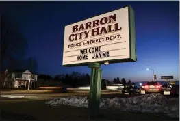  ?? AARON LAVINSKY/STAR TRIBUNE VIA AP ?? The sign outside City Hall in Barron, Wis., welcomes home Jayme Closs, a 13-year-old Wisconsin girl who went missing in October after her parents were killed.