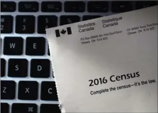  ?? CANADIAN PRESS FILE PHOTO ?? A Statistics Canada 2016 Census mailer sits on a laptop after arriving in the mail at a residence in Ottawa on May 2, 2016. On Wednesday, Statistics Canada will release the first batch of data from the 2016 census.