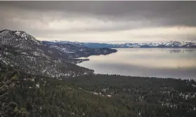  ?? Max Whittaker / Special to The Chronicle ?? Incline Village, Nev., in the foreground, on the shores of Lake Tahoe, passed a set of new rules governing shortterm property rentals.