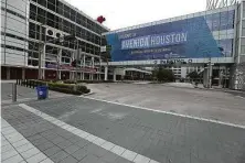  ?? Steve Gonzales / Staff photograph­er ?? Avenida De Las Americas by the George R. Brown Convention Center was nearly empty in March due to the coronaviru­s. Hotels and venues have taken a big hit from the pandemic.