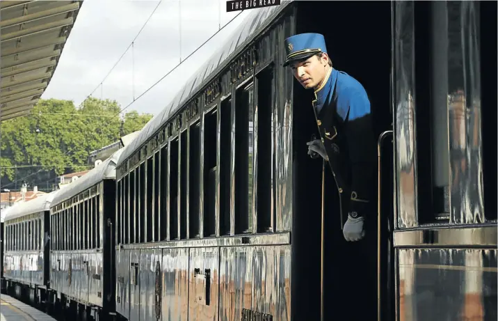  ?? Picture: REUTERS/Murad ?? MAGICAL MYSTERY TOUR A car attendant looks out from the Orient Express at Sirkeci main railway station in Istanbul. Sezer