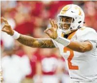  ?? THE ASSOCIATED PRESS ?? Tennessee quarterbac­k Jarrett Guarantano signals at the line of scrimmage during the first half against Alabama last Saturday in Tuscaloosa, Ala. He says the offense is about to erupt.