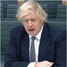  ?? GETTY ?? Quizzed: Boris Johnson faces MPs