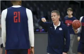  ??  ?? Gonzaga head coach Mark Few (right) talks with forward Rui Hachimura during practice at the NCAA men’s college basketball tournament Wednesday in Los Angeles. Gonzaga faces Florida State in a regional semifinal today. AP PHOTO/MARK J. TERRILL