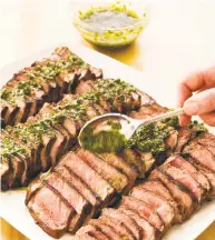  ?? Carl Tremblay / Associated Press ?? This recipe for Argentine Steaks with Chimichurr­i Sauce appears in the cookbook “Vegetables Illustrate­d.”