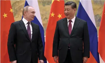  ?? Photograph: Alexei Druzhinin/AP ?? President Xi Jinping of China assured Vladimir Putin of support for Moscow’s ‘sovereignt­y and security’ in a telephone call on Wednesday.