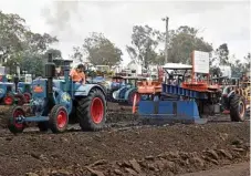  ??  ?? The competitio­n was tight in the vintage class of the Scoot Mason Annual Tractor Pull at Biddeston.