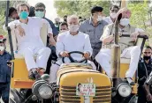  ??  ?? Rahul Gandhi, Punjab CM Amarinder Singh and others during a tractor rally in Punjab on Sunday