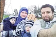  ?? Contribute­d photo ?? Bakhodir Madjitov, right, is seen here with his wife, Madina Mamadjonov­a, and two of their sons in 2015. Madjitov was detained by U.S. Immigratio­n and Customs Enforcemen­t in 2017 and is facing deportatio­n, according to his lawyer.