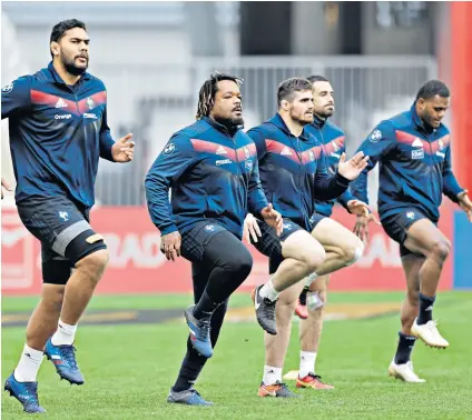  ??  ?? Tall order: Sebastien Vahaamahin­a (left) with his France team-mates