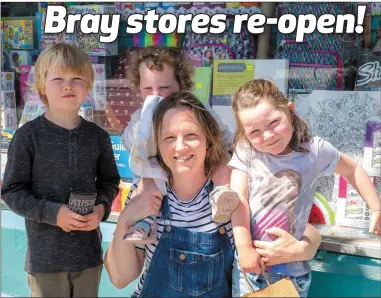  ??  ?? Valerie Collins with children Ted, Pearl and Trudy at Michael Doherty School Supplies, Bray.