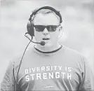  ?? MARK TAYLOR THE CANADIAN PRESS ?? Saskatchew­an Roughrider­s head coach Chris Jones, who usually only wears black, sports a Diversity is Strength T-shirt.