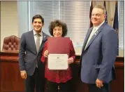  ?? PHOTO COURTESY MONTGOMERY COUNTY, PA ?? Inductee Joann McDonald is shown with county Board of Elections Chairman Neil Makhija, and county Commission­er Tom DiBello.