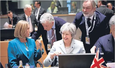  ?? Picture: Getty Images. ?? Theresa May and vice-president of the European Council Federica Mogherini attend the EU’s Eastern Partnershi­p Summit in Brussels.