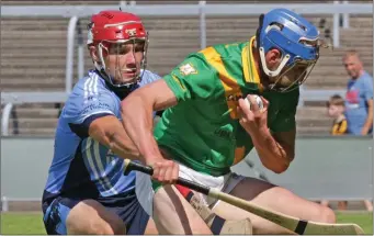  ??  ?? Ross Donohoe of Buffers Alley tries to get away from Seamus Mythen (St. Anne’s) in the Pettitt’s SHC clash in Innovate Wexford Park on Sunday.