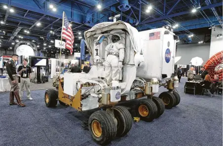  ?? Steve Gonzales / Staff photograph­er ?? A NASA space vehicle is on display at the annual Space Commerce Conference and Exposition on Tuesday in Houston.