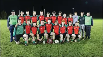  ??  ?? The St Kevin’s team and mentors after their Minor ‘B’ Shield final victory over Clara Gaels.