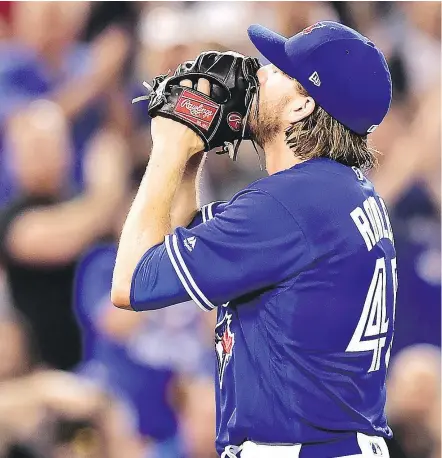  ?? — THE CANADIAN PRESS ?? Blue Jays starter Chris Rowley, who began the season in double-A, allowed a run in 52/3 innings against the Pittsburgh Pirates, leading Toronto to a 7-2 victory Saturday at Rogers Centre.