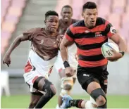  ?? Picture: FREDLIN ADRIAAN ?? SURGING FORWARD: Loose forward Diego Williams charges forward for the EP Elephants during their big 64-7 win over the Border Bulldogs at the Nelson Mandela Bay Stadium