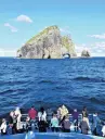  ?? PHOTO: BRUCE MUNRO ?? Hole in the Rock colossus, Motukokako Island, rises from the sea just off Cape Brett, Bay of Islands.