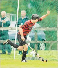  ?? Photograph by Neil Paterson. ?? Oban Camanachd’s Andrew MacCuish celebrates netting one of his three goals against Kilmallie.