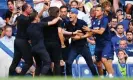  ?? Photograph: Javier García/ Shuttersto­ck ?? Thomas Tuchel (blue cap) faces a touchline ban for his post-match skirmish with Antonio Conte.