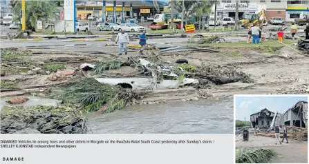  ?? | SHELLEY KJONSTAD Independen­t Newspapers ?? DAMAGED Vehicles lie among trees and other debris in Margate on the KwaZulu-Natal South Coast yesterday after Sunday’s storm.