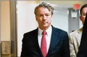  ?? ERIN SCHAFF / THE NEW YORK TIMES ?? U.S. Sen. Rand Paul, R-Ky., heads to the Senate floor Thursday night to continue delaying a vote on a budget agreement.