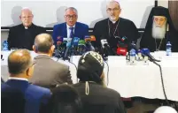  ?? (Ronen Zvulun/Reuters) ?? CHRISTIAN LEADERS address a news conference yesterday regarding the funeral of Al Jazeera reporter Shireen Abu Akleh.