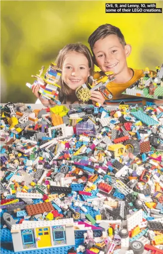  ??  ?? Orli, 9, and Lenny, 10, with some of their LEGO creations.