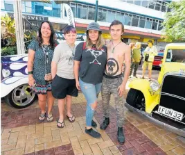  ?? Photo / Michael Cunningham ?? Whanga¯ rei car enthusiast­s Maundena Wood, Phoenix Sigley, Skye Sigley and Karl Smith check out the show.