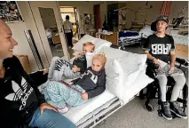  ?? PHOTO: JOSEPH JOHNSON/FAIRFAX NZ ?? Daniel ‘Mccown with his partner Jodie Preston, daughter Mylee Mccown, 5, and son Cooper Mccown, 6 years old in his room.