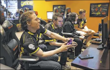  ?? Erik Verduzco Las Vegas Review-Journal @Erik_Verduzco ?? Freddie Omar Williams, left, of Henderson, and Dakota Goode, of Las Vegas, compete in an esports tournament Saturday at GameWorks.