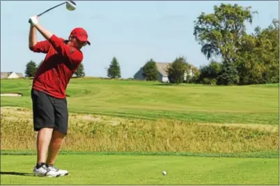  ?? PETE BANNAN — DIGITAL FIRST MEDIA ?? Coatesvill­e’s Ryan Jackson tees off on the 12th hole Tuesday during the Ches-Mont League Golf Championsh­ips at Applecross Country Cub.