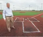  ?? D. KEVIN ELLIOTT/FOR THE INDIANAPOL­IS STAR ?? Westfield Mayor Andy Cook stands near home plate on the championsh­ip baseball field at the 400-acre Grand Park sports complex.