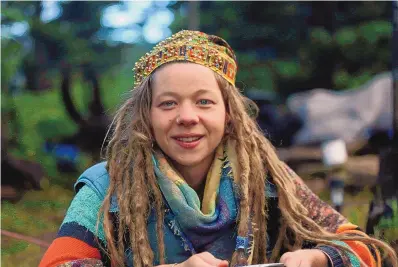  ?? CEDAR ATTANASIO/ASSOCIATED PRESS ?? Rainbow Gathering participan­t Kendra Strebig on Friday in the Carson National Forest outside Taos.